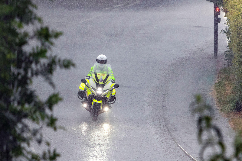 Blood biker riding in the rain